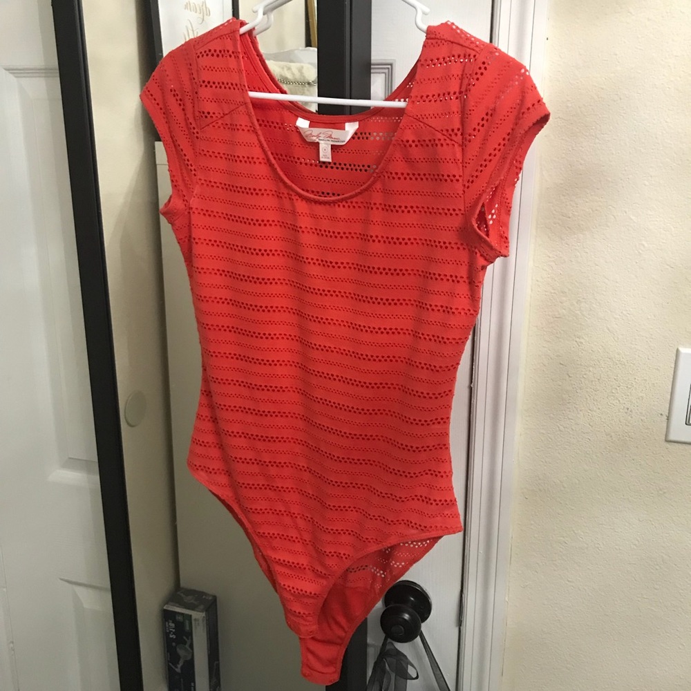 Orange body suit, size medium.